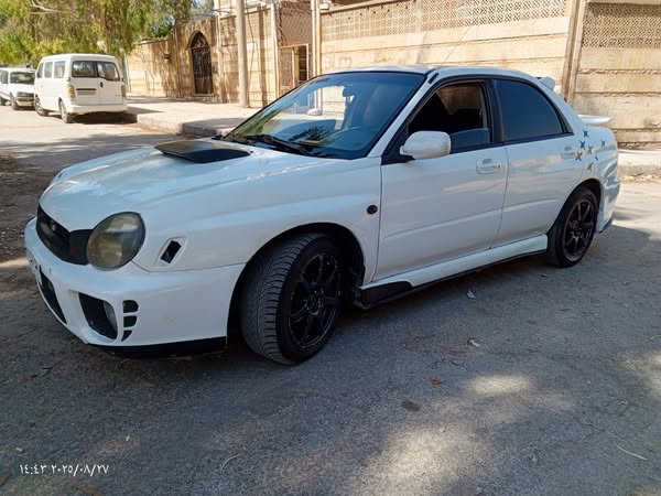 سوبارو امبريزا 2002 - صورة 1