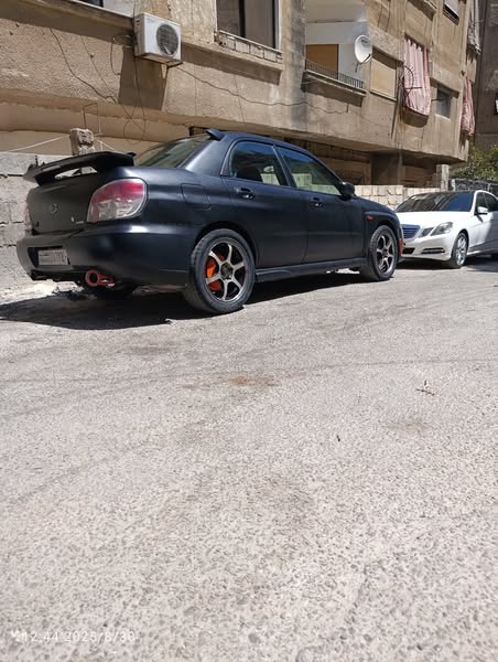 سوبارو امبريزا 2006 - صورة 1