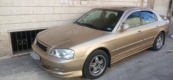 كيا أوبتيما 2001 - صورة 3