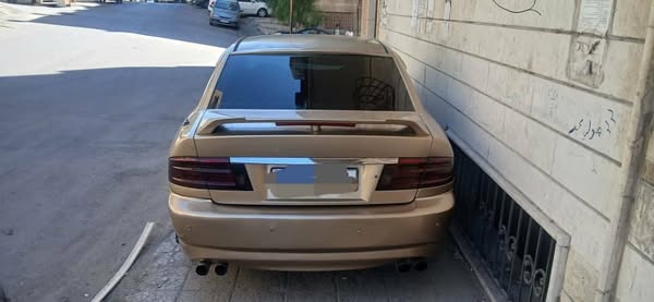 كيا أوبتيما 2001 - صورة 5