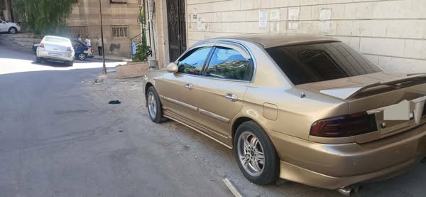 كيا أوبتيما 2001 - صورة 2