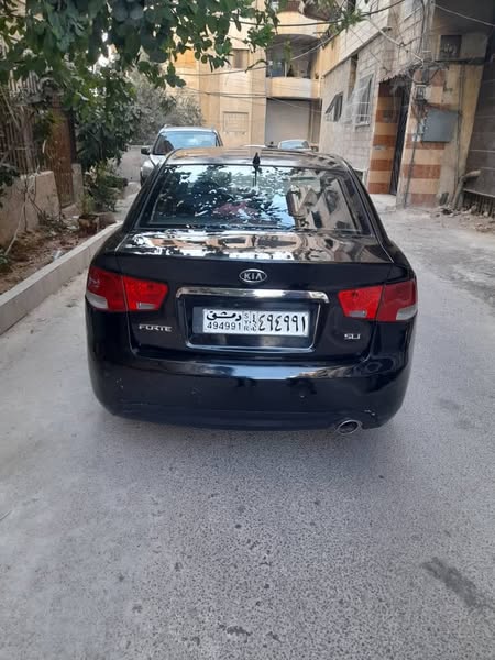 كيا فورتي 2010 - صورة 3