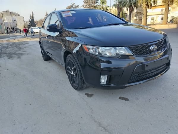 كيا فورتي 2011 - صورة 4