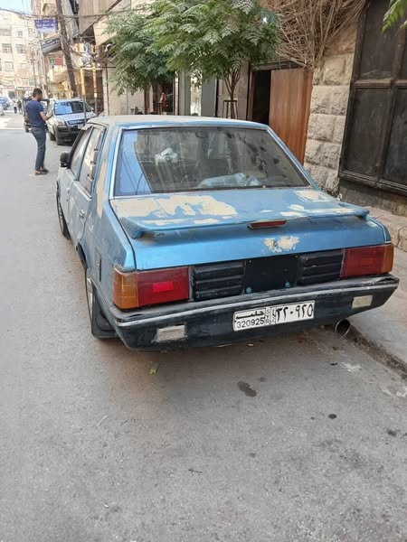 Mitsubishi Lancer 1983 - صورة 1
