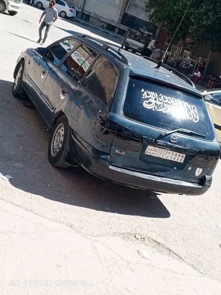 مازدا سيشن 2000 - صورة 2