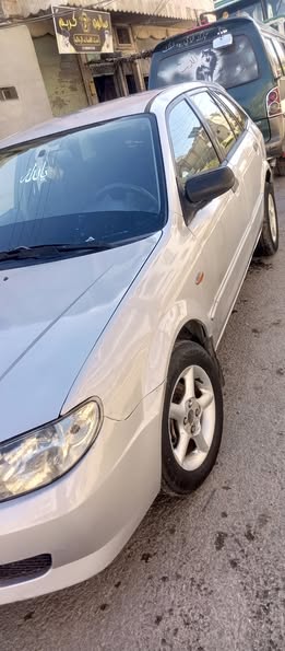 مازدا 323 2002 - صورة 1