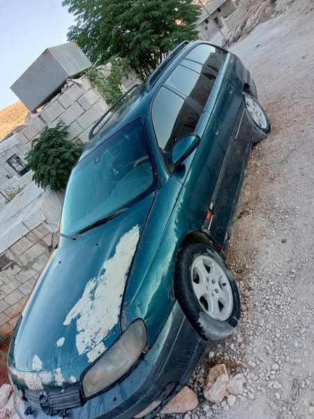 Opel Omega 2000 - صورة 5