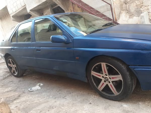 بيجو 605 1993 - صورة 1