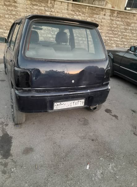 داي هاتسو شاريد 2002 - صورة 2