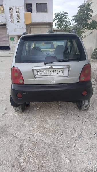 شيري كيو كيو 2003 - صورة 2