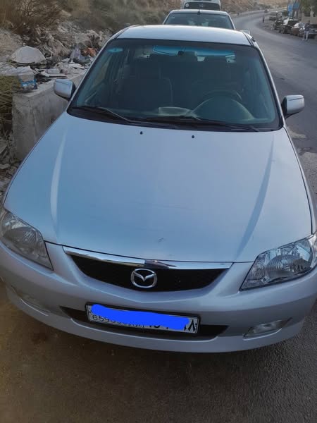 مازدا 323 2002 - صورة 4