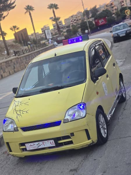 دايهاتسو كوور 2005 - صورة 3