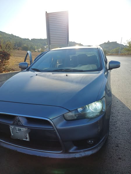 ميتسوبيشي لانسر 2015 - صورة 1