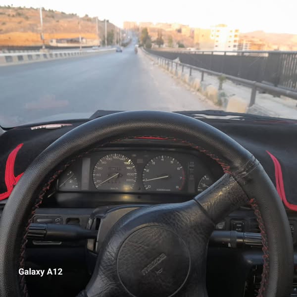 مازدا 323 1993 - صورة 1