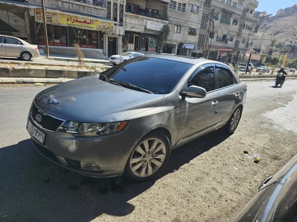 كيا فورتي 2011 - صورة 5