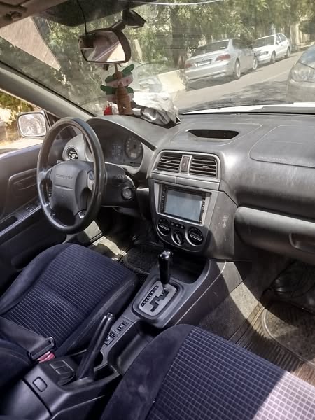 سوبارو امبريزا 2004 - صورة 5