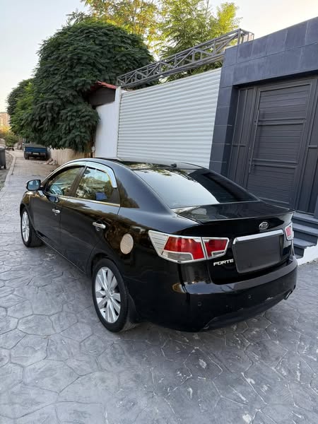كيا فورتي 2010 - صورة 2