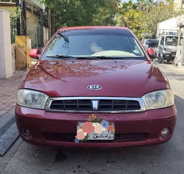 كيا Sephia 2004 - صورة 1