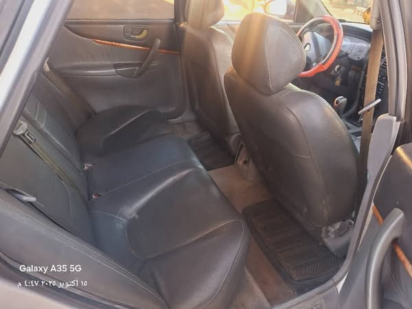 بروتون واجا 2004 - صورة 5