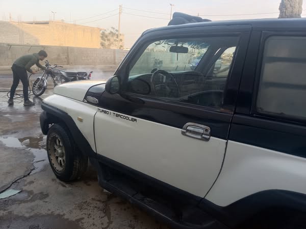 سانج يونج كوراندو 2002 - صورة 1