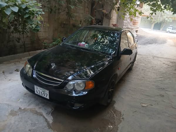 كيا شوما 2003 - صورة 3