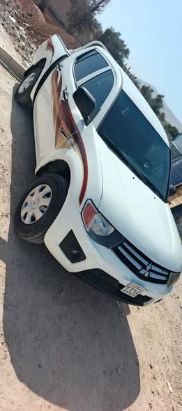 ميتسوبيشي Pickup 2013 - صورة 1