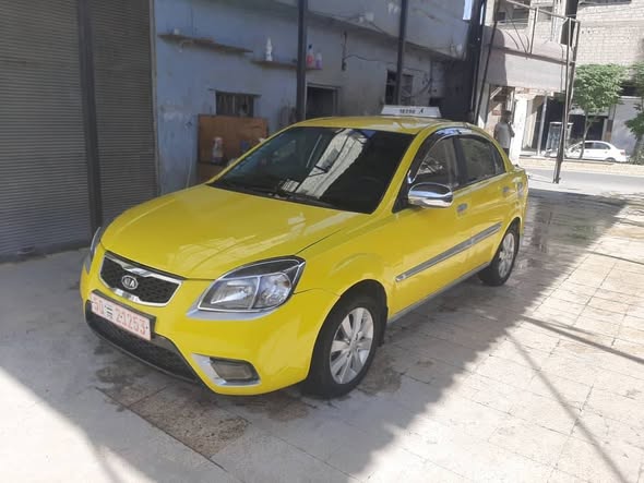 كيا ريو 2011 - صورة 1