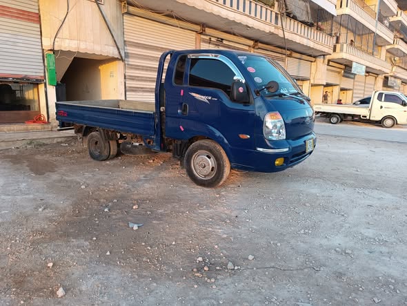 كيا بانجو 2010 - صورة 4