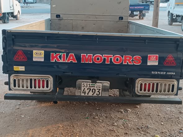 كيا بانجو 2010 - صورة 4