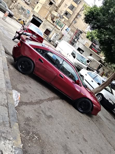 مازدا 323 1996 - صورة 1