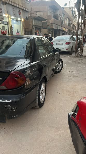 كيا سيفيا 2001 - صورة 4