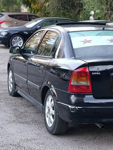 أوبل أسترا 2004 - صورة 3