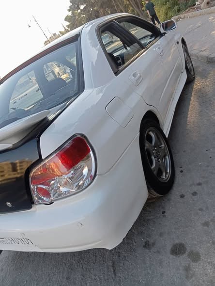 سوبارو امبريزا 2003 - صورة 1