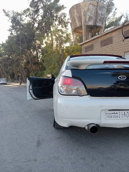 سوبارو امبريزا 2003 - صورة 2