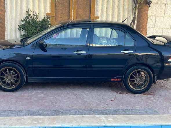 ميتسوبيشي لانسر 2003 - صورة 2