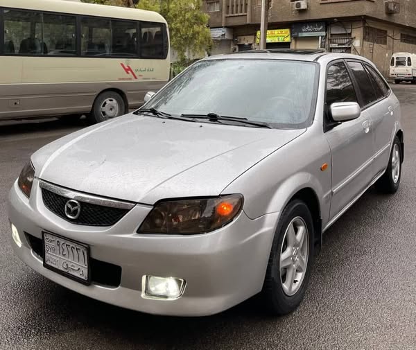 مازدا 323 2003