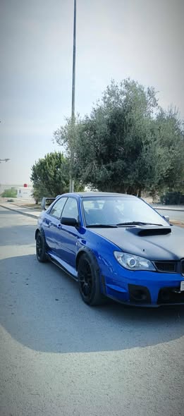 سوبارو امبريزا 2001 - صورة 1