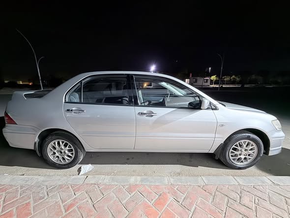 ميتسوبيشي لانسر 2002 - صورة 1