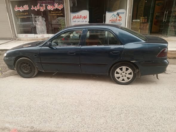 مازدا ٦٢٦ 1998 - صورة 1