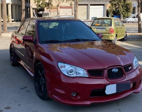 سوبارو امبريزا 2002 - صورة 1