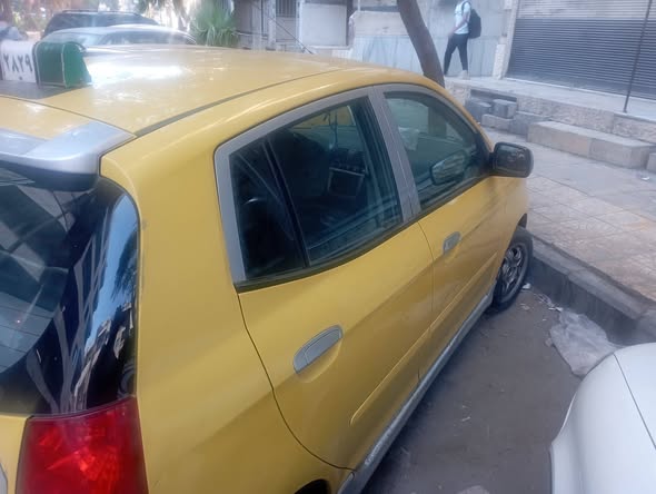 كيا مورنييغ 2003 - صورة 2