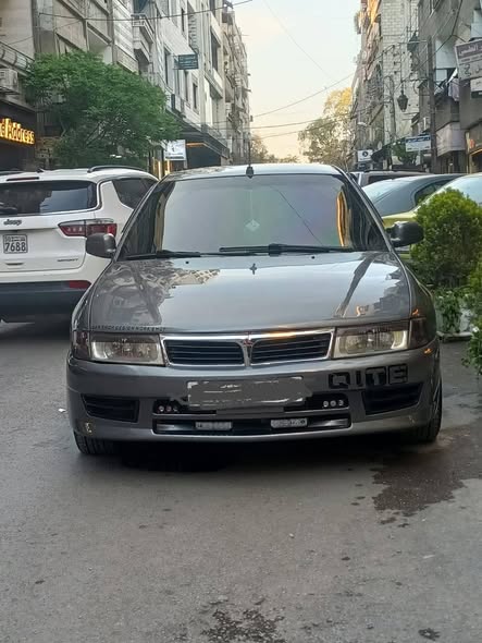 ميتسوبيشي لانسر 1998 - صورة 1