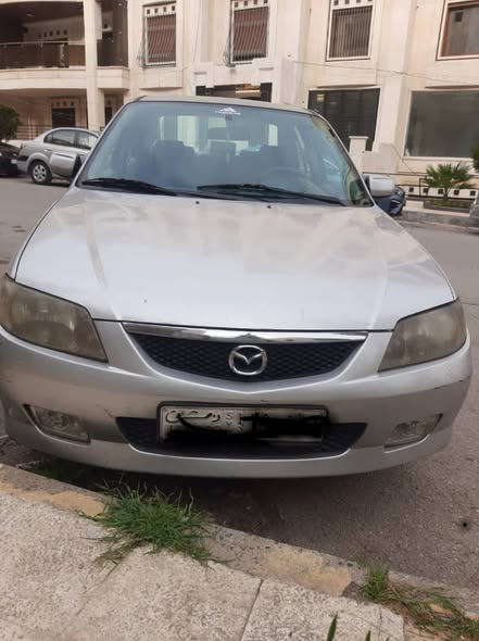 ماذدا 323 2002 - صورة 1