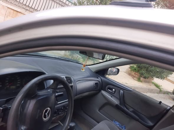 ماذدا 323 2002 - صورة 4