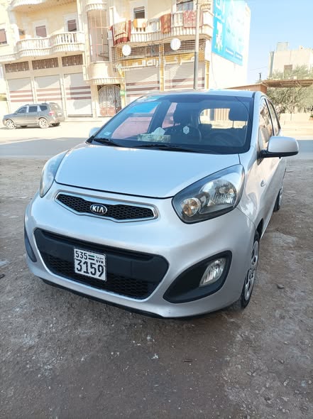 كيا مورنك 2012 - صورة 1