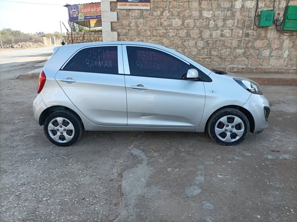 كيا مورنك 2012 - صورة 5