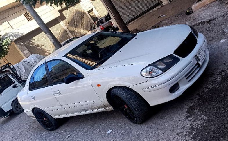 نيسان ساني 2002