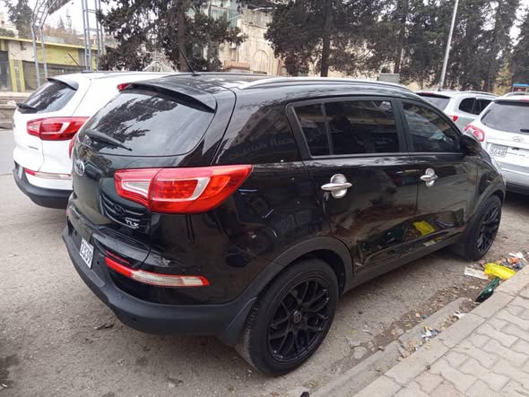 كيا سبور تاج 2013 - صورة 3