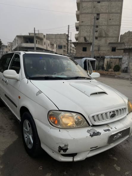 كيا كرنفال 2002 - صورة 2