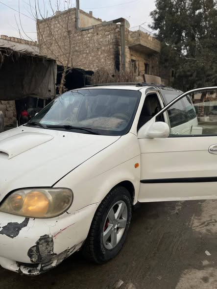 كيا كرنفال 2002 - صورة 5